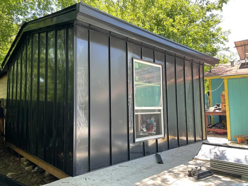 Black standing seam metal wall panels for Roof Inspection in Winfield