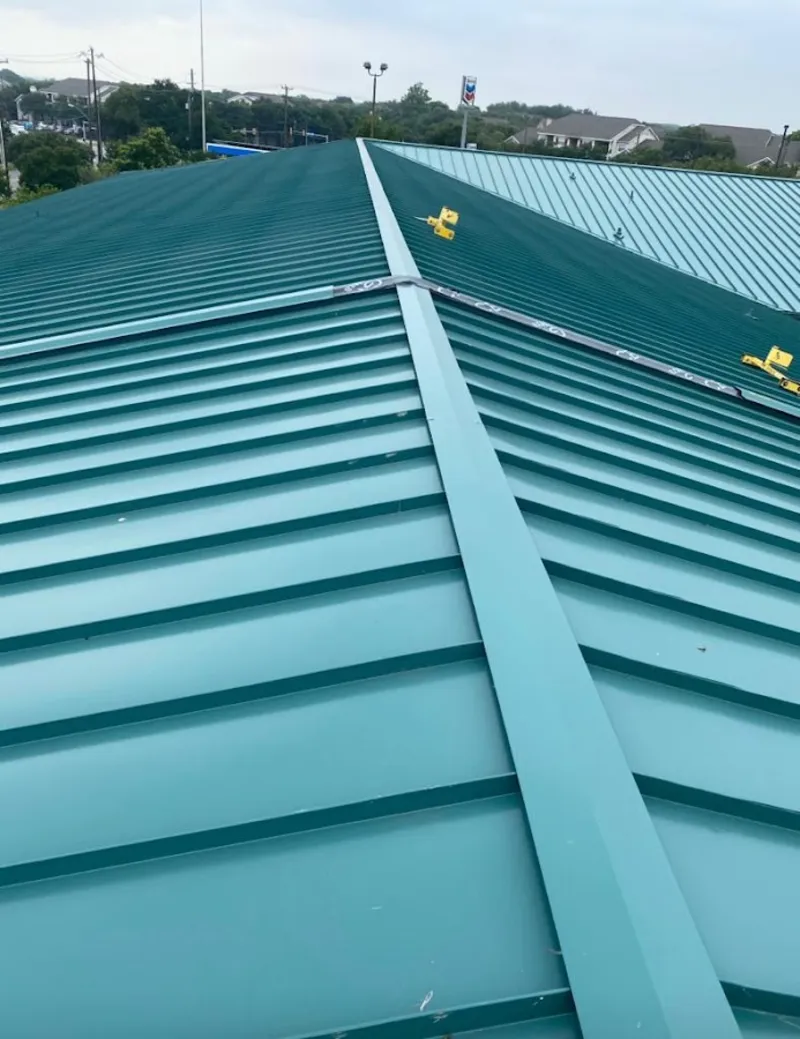 Green commercial metal roof ridge and valley for Metal Roof Repair in Winfield